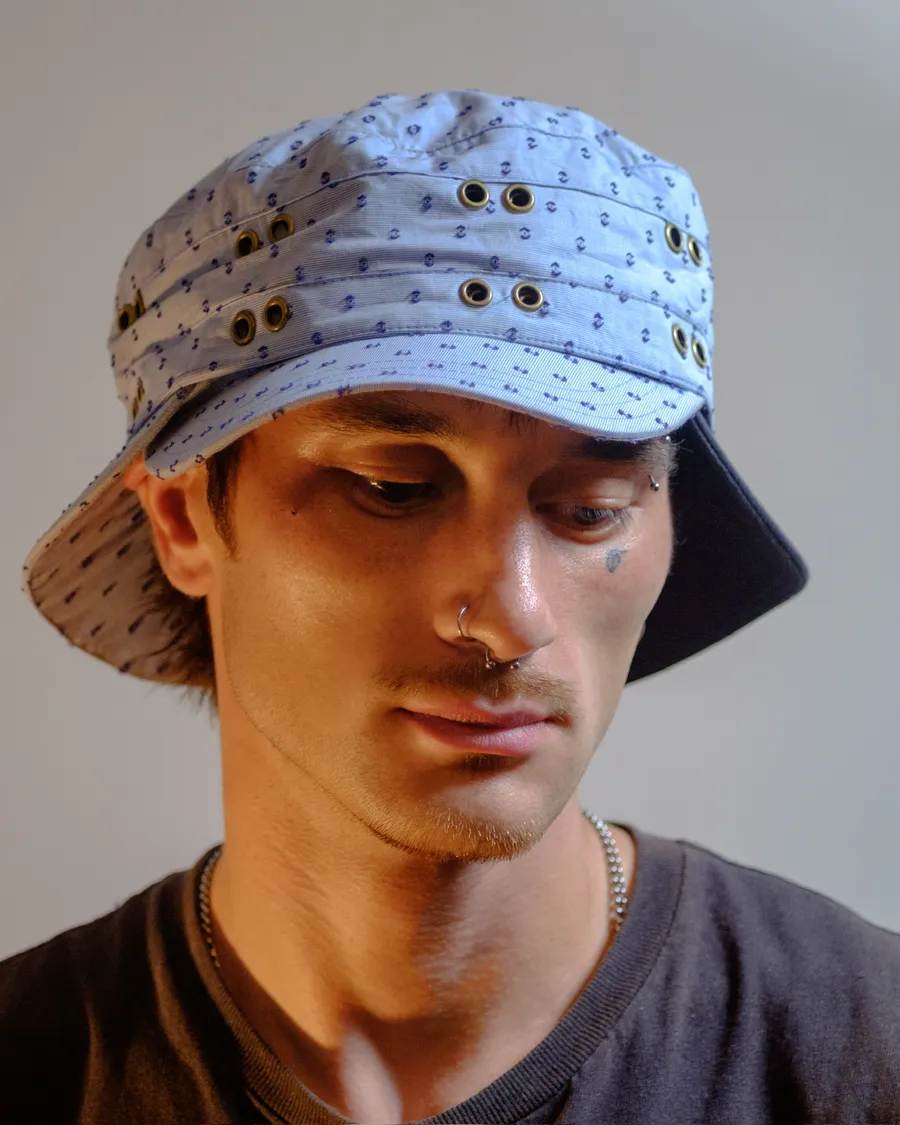 Cap worn in bucket shape with the brim down